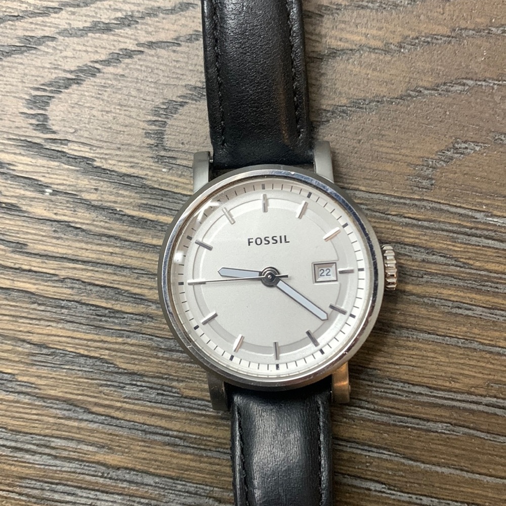 Silver fossil watch